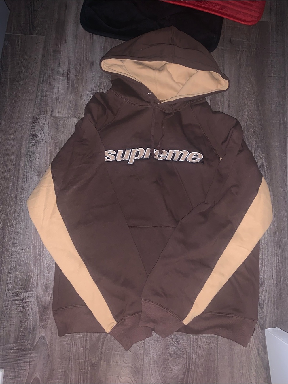 Supreme Brown Hoodie with Beige Sleeve Panels and Logo